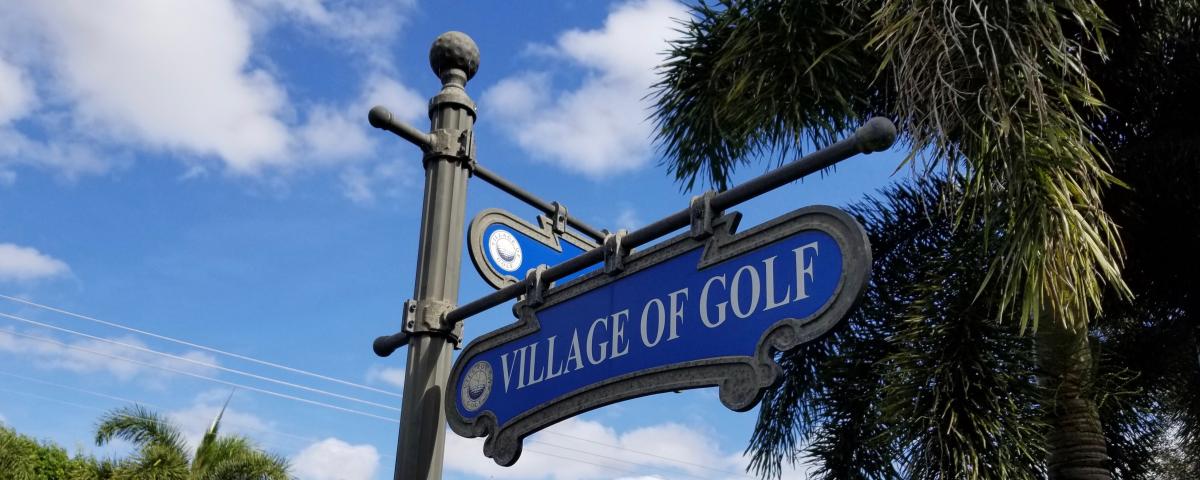 Street sign reading Village of Golf