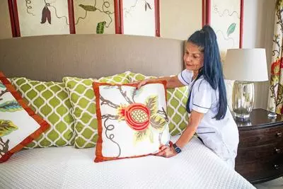 Woman making a bed